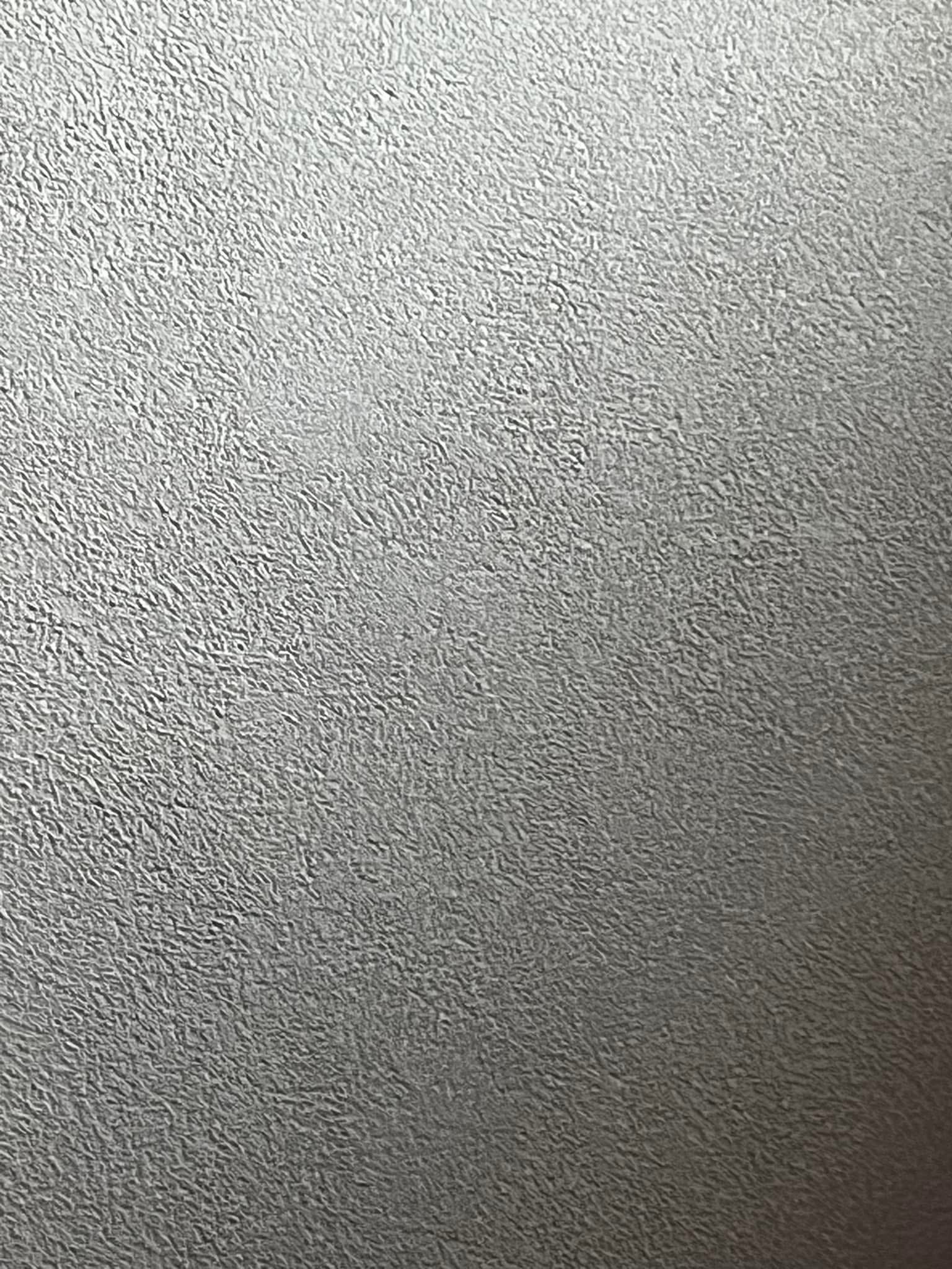 Enduit décoratif gris perle